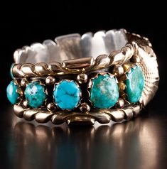 Vintage 14k Yellow Gold & Sterling Silver Zuni Morenci Turquoise Cuff BraceletMetal Information: 14k Yellow Gold & Sterling SilverTotal Weight: 86.2gBracelet Width: 27mmBracelet Length: 5.25"Bracelet Opening: 1.5"Circa: 1970'sCenter Stone: MorenciSide Stones: Sleeping BeautyStone InformationMain StoneGem Type: Morenci TurquoiseShape: Cabochon (25 x 20mm)Color: BlueClarity/Quality: ANumber of Stones: 1Accent StonesGem Type: Sleeping Beauty TurquoiseShape: Oval (13.8 x 12mm)Color: Blue / GreenClar Morenci Turquoise, Metal Cuff Bracelet, Turquoise Bracelet Cuff, Jewelry Website, Turquoise Cuff, Sleeping Beauty Turquoise, Custom Jewelry Design, Metal Bracelets, Estate Jewelry