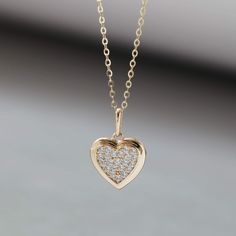 "14K Solid Gold Necklace Heart Pendant Necklace Diamond Necklace Minimalist Jewellery Dainty Necklace for Women Necklace for Girls Embrace the symbol of love and elegance with our 14K Solid Gold Heart Pendant Necklace. This dainty and minimalist jewelry piece showcases a stunning design of a heart pendant, with diamonds of Cubic Zirconia, adding a touch of sparkle to any outfit. Perfect for women and girls, it's a timeless and cherished accessory that effortlessly enhances your beauty. * Materials: 14K Solid Gold (AU585), Cubic Zirconia  * Dimensions: Length of the pendant 15mm, Heart: 10.3*9.3mm, Chain 45cm * Care: \"I am a dainty 14K solid gold necklace. Please be gentle and handle with extra care. ♡\" ♡ The item is a perfect gift for different occasions and purposes, such as a Birthday Jewellery Dainty, Pendant Necklace Diamond, Necklace For Girls, Minimalist Jewellery, Beautiful Anklet, Solid Gold Necklace, Heart Pendant Gold, Necklace Diamond, Necklace Heart