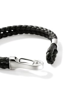 This handcrafted bracelet features braided leather and glinting sterling silver. Clasp closure Leather/sterling silver Imported Black Leather Jewelry With Palladium Hardware, Luxury Everyday Leather Bracelet, Classic Silver Leather Bracelet With Palladium Hardware, Designer Silver Leather Bracelet With Palladium Hardware, Modern Leather Braided Bracelet For Everyday, Modern Black Leather Bracelet With Sterling Silver, Classic Bracelets With Palladium Hardware For Everyday, Timeless Leather Bracelets For Formal Occasions, Timeless Leather Strap Bracelet For Formal Occasions