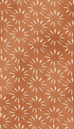 an orange and white pattern on fabric