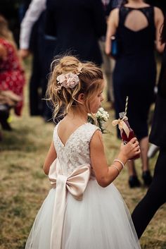 Look no further for the perfect flower girl dress! Maryanne in Ivory + Blush is a showstopper - made of soft tulle, light weight and topped with a luxurious velvet style bodice plus pearlescent capped sleeves. Your littlest gal (and everyone else) will be feeling like royalty!  ~ Product details Ivory skirt Blush bodice + bow Zipped back. Removable bow. No lace on the skirt, making hemming the skirt possible.  Lightweight fabric. Six layers of fabric (skirt). SIZING Chest | Waist | Hips | Should Flower Girl Updo, Pearls Crown, Blush Flower Girl Dresses, Ivory Flower Girl, Ivory Flower Girl Dresses, Wedding Flower Girl Dresses, Flower Girl Hairstyles, Blush Flowers, Wedding Flower Girl