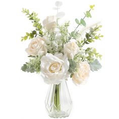 a vase filled with white flowers and greenery