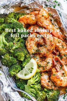 shrimp and broccoli wrapped in foil with lemon wedges