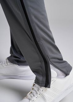 About Our Tall Men's Pants These men's tall athletic pants are a classic take on an athleisure essential. When it comes to athleisure, a good fit is key. You need something that's comfortable enough to relax in yet capable enough to work out in – but as a tall guy, it can be hard to find options that work for your height. You either have to compromise on a baggy fit or settle for lengths that are way too short. Not anymore. We know how hard it is to find quality styles when you're tall, which is Functional Moisture-wicking Full-length Sweatpants, Moisture-wicking Full Length Sweatpants, Functional Moisture-wicking Full Length Sweatpants, Functional Full-length Moisture-wicking Sweatpants, Casual Full Length Sweatpants For Training, Full Length Moisture-wicking Pants For Sports, Gray Breathable Sportswear Pants, Breathable Gray Joggers Sportswear, Breathable Gray Joggers, Sportswear