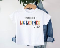 Big Brother t-shirt T-shirt is 100% cotton.  We design & print our products with care & love! We use the best quality vinyls, inks & transfers on all products. * * * * * * * * * * * * * * * * * * * * * * * * * * * * * CARE INSTRUCTIONS: Wash inside out on gentle wash, Do not tumble dry. * * * * * * * * * * * * * * * * * * * * * * * * * * * * * SHIPPING: We want to get your product to you as quickly as possible, your purchase will be shipped through Australia post, Express post is available for selection. * * * * * * * * * * * * * * * * * * * * * * * * * * * * * GUARANTEE: We stand behind our products with a 100% guarantee; if you are unsatisfied with our product, please let us know & we will rectify any issues. We are unable to refund products due to change of mind or those that are person Promoted To Big Brother Shirt, White T-shirt With Name Print For Gender Reveal, Short Sleeve T-shirt With Name Print For Gender Reveal, Gender Reveal T-shirt With Name Print, White Letter Print T-shirt For Gender Reveal, Crew Neck T-shirt For Gender Reveal With Text Print, Funny Text Short Sleeve T-shirt For Gender Reveal, Big Brother Pregnancy Announcement, Big Brother Announcement