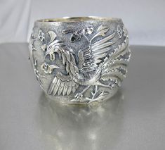 Antique Chinese Sterling Bracelet. Wide Sterling Silver Dragon Phoenix Storyteller Wedding Bracelet Qing Dynasty. Victorian Engraved Cuff Bracelet For Ceremonial Occasion, Traditional Engraved Wide Band Jewelry, Antique Etched Bracelets For Wedding, Traditional Wide Band Engraved Jewelry, Antique Engraved Wide Band Jewelry, Antique Wide Band Engraved Jewelry, Victorian Style Ceremonial Cuff Bracelet With Intricate Design, Victorian Cuff Bracelet With Intricate Design For Ceremonial Occasions, Victorian Cuff Bracelet With Intricate Design For Ceremonial