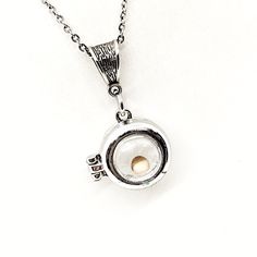 This beautiful necklace would make a wonderful gift to remind someone that with faith the size of a mustard seed, we can move mountains. It is a silver-tone mustard seed magnifying ball locket pendant with a single mustard seed inside. The pendant comes on a stainless steel link chain. This pendant is available on your choice of 16, 18, 20, 22, 24, 26, 28 or 30 inch chain. The pendant is also available for individual purchase if you have another chain on which you would like to wear it. This jew White Locket Necklace For Memorial, Silver Round Locket Necklace With Birthstone, Silver Spiritual Charm Necklaces For Keepsake, Spiritual Silver Charm Necklace For Keepsake, Spiritual White Charm Necklace Nickel-free, Spiritual Nickel-free Necklaces For Memorial, Spiritual White Charm Necklace Nickel Free, Spiritual White Charm Necklace, Nickel Free, Silver Spiritual Charm Necklace With Locket