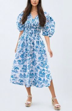 The hand-illustrated floral dress is made from poplin fabric and features a smocked panel, V-neckline, three-quarter length puff sleeves, and a rear tie fastening. Each print is carefully hand-painted in our New York design studio, and the dress comes in a high-end gift box. 100% Poplin Smocked panel Rear tie fastening Side-seam pockets Toile Dress, New York Design, V Neck Midi Dress, Blue Midi Dress, Hand Illustration, Poplin Fabric, Nordstrom Dresses, Puff Sleeves, Three Quarter