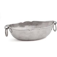 a large silver bowl with handles