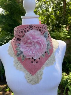 Looking for a fun accessory or gift?  This one of a kind soft distressed pink bandana is embellished with a flower applique and a lace embellished edge.  This is the perfect accessory to top off your country music concert outfit.  This embellished bandana has been tea stained and tattered slightly to give it a soft vintage vibe.  Have fun with it as it is the perfect accessory to most any boho, cowgirl chic or festival outfit.  All fabrics are sanitized before assembly. Thank you for visiting my site Upcycle Lace, Pink Cowgirl Outfit, Bandana Clothes, Country Music Concert Outfit, Flower Bandana, Fun Hats, Country Festival, Crochet Wallet, Pink Bandana