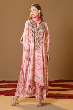 Pink kurta with floral print, handwork dabka, sequence and pearl embroidery. Paired with a coordinating painted palazzo pant and a printed dupatta. - Aza Fashions Festive Floor-length Palazzo Set With Printed Motifs, Floor-length Palazzo Set With Printed Motifs For Festive Occasions, Floor-length Palazzo Set With Printed Motifs For Navratri, Eid Silk Palazzo Set With Dabka Work, Floor-length Printed Palazzo Set For Navratri, Eid Sharara With Printed Motifs In Maxi Length, Eid Sharara With Printed Motifs And Maxi Length, Floor-length Silk Sets With Printed Motifs, Eid Wedding Palazzo Set With Printed Motifs