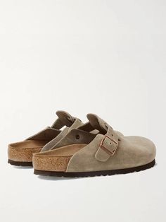 Don't be fooled into thinking Birkenstock clogs are simply chosen for comfort and not style, they're worn by countless well-dressed men. Made in Germany from soft suede, this closed-toe 'Boston' pair is built with the brand's signature moulded footbeds and gripped rubber soles. The buckled strap can be adjusted for the perfect fit.