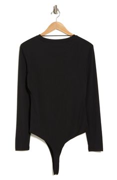 This closet-workhorse bodysuit is textured in shapely allover ribbing for a layer-perfect fit. Crewneck Long sleeves 63% rayon, 37% polyester Machine wash, line dry Imported Black Stretch Bodysuit For Layering, Spring Stretch Bodysuit For Layering, Black Fitted Bodysuit For Layering, Fitted Black Bodysuit For Layering, Black Bodysuit For Workwear In Spring, Black Bodysuit For Spring Workwear, Black Bodysuit For Work In Spring, Stretch Bodysuit For Workwear In Fall, Spring Workwear Black Bodysuit