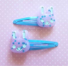 A set of two kawaii bunny hair clips! They are perfect for any kawaii, Pastel Goth or Fairy Kei look! ☆They are made of resin and glitter. ☆Each bunny measures about 1 inch. ☆Clips are 2 inches length in total If you have any questions , please message me through Etsy! I can do other colors too! Please message me with what you are thinking! Uchuu Kei, Pastel Accessories, Kawaii Hair Clips, Bunny Hair, Kawaii Hair, Kawaii Pastel Goth, Purple Bunny, Magical Boy, Pastel Goth Fashion