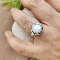 * Product Information Natural Pearl Ring, Handmade Silver Ring, 925 Sterling Silver Ring, Round Fresh Water Pearl Ring, June Birthstone Promise Ring Gift for her ✦ M E T A L : Sterling Silver 925 Handmade item Materials: Silver, Stone Gemstone: Pearl Gem color: White Band color: Silver Style: Boho & Hippie ✦ S T O N E : Fresh Water Pearl ✦ B I R T H S T O N E : June Description Indian Pearl Silver Ring, Gemstone Pearl Jewelry,925 Sterling Silver Ring Indian Jewelry, Silver Ring, Christmas Gift. Sterling Silver Pearl Ring With Gemstone, Sterling Silver Pearl Birthstone Ring, Everyday Silver Pearl Ring, Everyday White Rings Stamped 925, Everyday White 925 Stamped Rings, Adjustable Pearl Birthstone Ring, Fresh Water Pearl Ring, Birthstone Promise Rings, Natural Pearl Ring