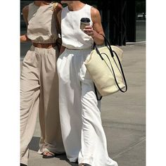 Elevate Your Summer Wardrobe With This Chic White Two-Piece Ensemble. The Set Features A Sleeveless Crop Top With A Round Neckline And A Subtle Gathered Waist, Paired With Flowing Wide-Leg Pants. Perfect For A Sophisticated Casual Look Or Dressed Up For Special Occasions. The Lightweight Fabric Ensures Comfort While Maintaining A Polished Appearance. Versatile And Stylish, This Set Is A Must-Have For The Fashion-Forward Individual. Details Composition: 30% Linen, 30% Polyester, 30% Viscose, 10% White Two Piece Set, Sophisticated Casual, White Two Piece, Sleeveless Crop Top, Summer Wardrobe, Lightweight Fabric, Cotton Linen, Fabric Color, Round Neckline