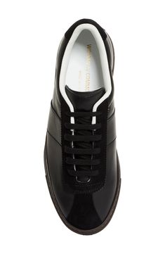 Goatskin suede adds contrasting tone and texture at the lacing cage, toe and heel on this sleek low-top sneaker crafted from smooth calfskin leather and stamped in gold with its ID. Lace-up style Leather upper and lining/rubber sole Made in Italy Designer Shoes Luxury Rubber Heel Cap Lace-up Sneakers, Luxury Lace-up Sneakers With Rubber Heel Cap, Modern Custom Sneakers With Contrasting Heel Counter, Luxury Low-top Custom Sneakers With Rubber Heel Cap, Modern Custom Sneakers With Leather Sole, Designer Leather Low-top Sneakers, Luxury Sneakers With Rubber Heel Cap And Round Toe, Modern Leather Sneakers With Contrasting Heel Counter, Modern Low-top Sneakers With Contrasting Heel Counter