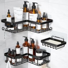 two black shelves with soap and lotion bottles on them