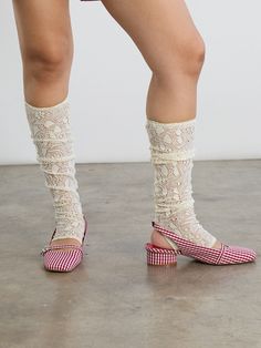 Spring White Lace Legwear, White Lace Legwear For Spring, White Footless Leg Warmers For Spring, Spring Lace Legwear With Stretch, Spring Lace Stretch Legwear, Spring Stretch Lace Legwear, White Footless Legwear For Spring, Spring Cream Fitted Legwear, Summer Lace Socks With Lace Trim