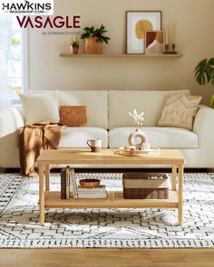 a living room with a white couch and coffee table