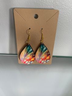 Beautiful, bright colored earrings.  Makes a great gift for you or someone on your gift list. Adjustable Rainbow Earrings As Gift, Multicolor Hand Painted Earrings, Colorful Earrings As A Gift, Trendy Multicolor Teardrop Earrings, Colorful Drop Earrings As A Gift, Colorful Hand Painted Drop Earrings, Rainbow Hypoallergenic Earrings As Gift, Nickel-free Rainbow Earrings Gift, Colorful Hand-painted Drop Earrings