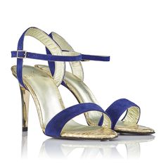 Description
Details
Shipping / Return



NAVY BLUE AND GOLD SUEDE SANDAL WITH GOLD-PLATED HEEL
Our Nice sandal inspires pure luxury in blue and gold

Made in navy blue suede and golden crocodile engraving, our Nice sandal is a wardrobe staple that will work for your most special events and summer nights. We love to combine it with mustard color or even with white jeans or nude or red tones.

Its gold-plated heel makes it more resistant to scratches and marks, and combined with navy blue it gives a point of distinction and of light to the design.

Its height is 8.5cm, our most comfortable last, and with internal gel padding, so you will wear them super comfortable and you will not have to deal with annoying foot pain.


If you want to change any color or make any changes to the design, let Golden Crocodile, Blue Bridal Shoes, White Bridal Shoes, Platform Shoes Sandals, Nice Sandals, Navy Blue And Gold, Metallic Shoes, Nude Shoes, Blue Bridal