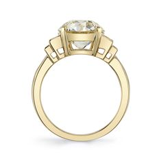 3.47ct L/VS1 GIA certified old European cut diamond with 0.44ctw Baguette cut diamond accents set in a handcrafted 18K yellow gold mounting. Ring is currently a size 6 and can be sized to fit. Stone Certificate 3.47ct L/VS1 Luxury Diamond Ring With Rose Cut Baguette Diamonds, Luxury Rose Cut Diamond Ring With Baguette Shape, Luxury Baguette Cut Diamond Ring With Rose Cut Diamonds, Luxury Baguette Cut Rose Cut Diamond Ring, Gold Asscher Cut Diamond Ring With Baguette Diamonds, Gold Baguette-cut Diamond Ring With Single-cut Diamonds, Gold Baguette-cut Diamond Ring With Single Cut Diamonds, Gold Diamond Ring With Single Cut Baguette Diamonds, Gold Diamond Ring With Asscher Cut