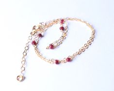 "Custom Length Sterling Silver / Gold Filled Genuine Ruby Beaded Necklace - 30th, 40th 50th 60th 70th Birthday Gift - July Birthstone Jewelry Minimal sterling silver or 14k gold filled necklace with 3-7 natural rubies. The perfect birthday gift. ✦ Comes in 14-18\", with additional 1\" extension chain ✦ The rubies are 2-3mm. Ruby has been originated from corundum family. Corundum of all colors is acknowledged as sapphire, except shades of red. Ruby is the traditional birthstone of those born in J Yellow Gold Ruby Bead Jewelry, Dainty Adjustable Ruby Jewelry, Adjustable Dainty Ruby Jewelry, Gold Ruby Single Strand Jewelry, Dainty Gold Ruby Jewelry, Gold Ruby Gemstone Beads Jewelry, Gift Ruby Gemstone Beads Jewelry, Ruby Gemstone Beads Jewelry Gift, Faceted Ruby Jewelry As A Gift