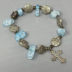 Glass Bead Bracelet Blue Crackled Nugget Cross Charm Stretch Silver Tone 7" Blue Metal Spiritual Bracelets, Spiritual Blue Metal Bracelets, Blue Vintage Nickel Free Bracelets, Vintage Blue Nickel-free Bracelets, Vintage Blue Nickel-free Bracelet, Glass Beaded Bracelets, Cross Charms, Blue Bracelet, Silver Tone