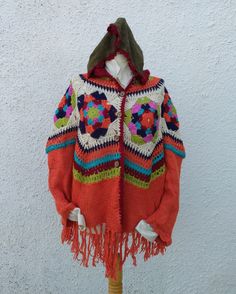 MANDALA BREEZE Hooded Colorful Fringed Cardigan, Boho Chic, Multicolored Crochet, Orange Hippy Tunic, Bohemian Crochet, Hippie by Papicca on Etsy Bohemian Long Sleeve Acrylic Cardigan, Bohemian Acrylic Cardigan, Bohemian Knitted Winter Sweater, Bohemian Fall Festival Sweater, Bohemian Crochet Acrylic Cardigan, One Size Bohemian Sweater, Casual Knitted Sweater For Festival, Handmade Knit One-size Cardigan, Bohemian Long Sleeve Acrylic Sweater