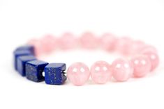 "Lapis Lazuli with Rose Quartz natural gemstone bracelet. The bracelet is made of beautiful genuine 10mm high-quality Madagascar Rose Quartz round beads combined with high-quality 8mm Lapis Lazuli squares separated by small Sterling Silver rondells. Please indicate your desired bracelet size. Rose Quartz is the most important crystal for the heart. Some say it helps to attract love and encourages proper self-love. The listing is only for the Lapis Lazuli/Rose Quartz combination bracelet. The Ros Elegant Rose Quartz Healing Bracelets, Lapis Lazuli Gemstone Beads Bracelet For Gift, Lapis Lazuli Gemstone Beaded Bracelet For Gifts, Lapis Lazuli Beaded Bracelet Gift, Rose Quartz Gemstone Beaded Bracelets As Gift, Rose Quartz Gemstone Bracelets With Round Beads, Rose Quartz Bracelets With Gemstone Round Beads, Rose Quartz 8mm Bead Jewelry As Gift, Rose Quartz Gemstone Bracelet With Round Beads