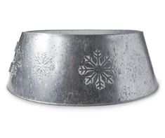 a metal bowl with snowflakes on it