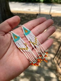 Native-made beaded fringe earrings on fish hooks Southwestern Beaded Fringe Dangle Earrings, Southwestern Style Beaded Fringe Dangle Earrings, White Beaded Fringe Jewelry For Crafting, Dangle Beaded Earrings With Fringe For Crafting, Artisan White Fringe Jewelry, Beaded Fringe Dangle Earrings, Fringe Round Beads For Diy Jewelry Making, Porcupine Quill Earrings, Quill Earrings