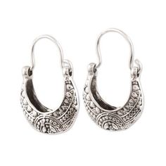 Resembling cradles these hoop earrings from India are created by Bhavya Jain. She crafts each crescent-shaped earring from sterling silver detailed with a lovely array of patterns that are treated with a combination of finishes. Nickel-free Crescent Jewelry, Oxidized Finish Hoop Earrings For Gifts, Ornate Silver Hoop Earrings With Intricate Design, Traditional Nickel Free Small Hoop Earrings, Traditional Nickel-free Small Hoop Earrings, Sterling Silver Hoop Jewelry With Intricate Design, Ornate Sterling Silver Hoop Earrings With Intricate Design, Small Hoop Sterling Silver Pierced Earrings, Sterling Silver Oxidized Hoop Earrings