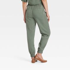 These High-Rise Jogger Pants from Universal Thread™ are made from lightweight lyocell fabric and tailored with a relaxed leg style to keep you in absolute comfort. The full elastic waist with drawstring offers an adjustable, secure fit, while the side pockets provide space for stashing everyday essentials. In a solid hue, they are easy to coordinate with a variety of tops for versatile wear. Universal Thread™: Found exclusively at Target. Lyocell Fabric, Shipt Shopper, Universal Thread, Bottom Clothes, Pull On Pants, Everyday Essentials, Chinos Pants, A New Day, Bottoms Pants