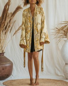 Presenting the Golden Lotus - Short Kimono, a unique piece from our slow fashion collection that's designed to radiate your confidence and individuality. This distinct piece is reversible, displaying meticulous craftsmanship and made-to-order for an opulent appearance that's sure to captivate attention. Size: Our model has the following measurements: Height: 172 cm | 5 ft 7 inches Chest: 88-94 cm | 35-37 inches She is wearing size M kimono with 85 cm | 33 inch length. Golden Lotus, Mesh Laundry Bags, Clothing And Textile, Short Kimono, Out Of Shape, Wrinkle Remover, Viscose Fabric, Slow Fashion, The Golden