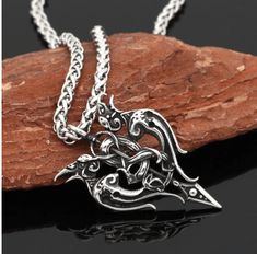 Hugin and Munin are two ravens in Viking mythology who are helping spirits of the god Odin. Huginn symbolizes the thought while Muninn represents mind or memory. In Norse mythology, they are a pair of ravens that fly all over the world, Midgard, and bring information to the god Odin. This pendant necklace adds a pretty appealing look to a whoever is wearing it. Material: Stainless SteelSymbol: Huginn and MunninColor: SteelChain Length: 60 cm Chain Type: Rope Chain / Snake ChainPendant Size: 5 cm Odin Raven, Hugin And Munin, Two Ravens, Nordic Symbols, Viking Aesthetic, Viking Mythology, Viking Odin, Odin's Ravens, Odin God