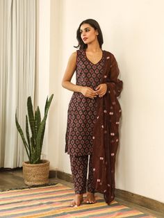 Beautiful handcrafted straight kurta pants set in pure cotton with lovely matching cotton doriya dupatta that is rightly finished with small floral embroidery motifs. Color: Black and Brown Fabric: Cotton and Kota Doria Note: Length and sizes can be customised Length - Kurta 40 inches Pants 38 inches Available in other colors If you happen to see some deformity in hand-work or fabric, that’s mere the technique of the same and not a defect. The garment is quite premium. The product will be delive Cotton Kurta Set, Printed Suit, Embroidery Detailing, Cotton Dupatta, Straight Kurta, Cotton Kurta, Kurta With Pants, Suit Fabric, Matching Pants