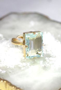 Aquamarine Crystal Ring Emerald Cut Swarovski Ring | Etsy Wedding Jewelry: Emerald Cut Topaz, Wedding Jewelry With Emerald Cut Topaz, Emerald Cut Topaz Jewelry For Weddings, Emerald Cut Topaz Wedding Jewelry, Emerald Cut Aquamarine Gold Jewelry, Aquamarine Jewelry With Center Stone For Wedding, Aquamarine Center Stone Jewelry For Wedding, Aquamarine Center Stone Wedding Jewelry, Aquamarine Wedding Jewelry With Center Stone