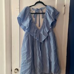 This One Is (I Believe) From The Marshall’s Junior / Cube Section. It Is So Cute, Just A Little Short If You’re A Tall Gal Like Me (I’m 5’10 And It Was A Little Too Babydoll-Ish). Never Worn, Tried On Once Blue V-neck Mini Dress With Tie Back, Light Blue Tie Back Mini Dress For Spring, Light Blue Summer Mini Dress With Tie Back, Light Blue Tie Back Summer Dress, Blue Backless Dress With Ruffles, Blue Flirty Dress With Tie Back, Blue Backless Dresses With Ruffles, Light Blue Flowy Mini Dress For Date Night, Flowy Light Blue Mini Dress For Date Night