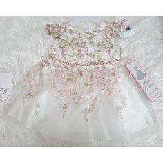 Embellished At Waist Lined Includes Matching Diaper Cover Polyester Hand Wash Embroidered Fitted Dress For Pageant, Fitted Embroidered Dress For Pageants, Fitted Embroidered Dresses For Pageants, Embroidered Fitted Dress For Pageants, White Princess Embroidered Dress, White Princess Style Embroidered Dress, White Embroidered Princess Dress, Fitted Baptism Dress With Floral Applique For Dress-up, Fitted Princess Baptism Dress For Spring