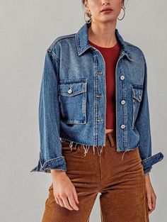 "Add some edge to your wardrobe with this frayed hem crop jean jacket.  The boxy fit and vintage oversized cargo pockets give it a unique, retro vibe. Available in white and blue denim, This piece it's perfect for all seasons and can be dressed up or down. This jacket is perfect for Y2K fashion style. Raw Edge Hem. Available in Small Medium and Large Sizes.  Non Stretch Fabric. Features long sleeves with buttoned cuffs, cropped length bodice. Oversized Boxy Fit. True to Size. Small (2/4), Medium (6/8), Large (10) Small: Fits size 2-4 Medium: Fits 6-8 Large: Fits 10-12 20\" Armpit To Sleeve End 7\" Armpit To Hemline Model is Wearing Size Small. Model: 5'9\"  32B bust, 25\" waist, and 36\" hips.  Color may vary slightly due to monitor resolution  100% cotton NO REFUNDS-please check sizing Pe Cropped Denim Jacket With Frayed Hem, Casual Cropped Denim Jacket With Frayed Hem, Cropped Blue Denim Jacket With Frayed Hem, Cropped Denim Outerwear With Frayed Hem, Vintage Denim Outerwear With Frayed Hem, Vintage Denim Jacket With Frayed Hem In Medium Wash, Vintage Medium Wash Outerwear With Frayed Hem, Vintage Outerwear With Frayed Hem In Medium Wash, Vintage Medium Wash Denim Jacket With Frayed Hem