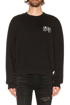 This classic Amiri Black Bandana Stars Sweatshirt provides an ideal combination of comfort and style. Crafted in the US with French terry fabric, it features a crewneck collar, a black and white graphic on the chest, and a logo bonded in white. Create a timeless look with the Bandana Stars Appliques on the back. Cotton Sweatshirt With Star Patch For Streetwear, Black Star Logo Top For Streetwear, Cotton Sweatshirt With Star Print And Relaxed Fit, Black Crew Neck Top With Star Patch, Black Star Print Sweatshirt For Streetwear, Black Bandana, Black And White Graphic, Terry Fabric, French Terry Fabric