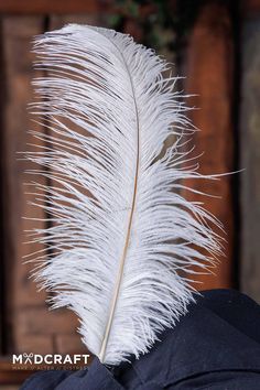 Enhance your hats with a distinctly medieval accent by adding one of these feathers. These feathers are ideal for elevating your historically inspired headwear and are perfect for a variety of character concepts, whether you’re participating in historical reenactments, LARPing, or diving into the world of cosplay. These feathers provide a striking silhouette that wonderfully captures the essence of a medieval look. Please note that the feathers are completely natural, so their appearance may var Historical Reenactment, Ostrich Feathers, Larp, Character Concept, Diving, Essence, Hats