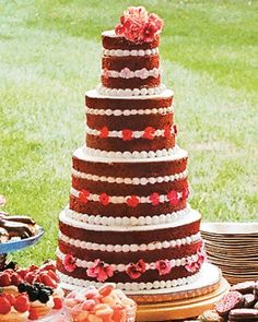 the wedding cake is displayed on an iphone screen, and it appears to be made from red velvet cakes with cream fillings