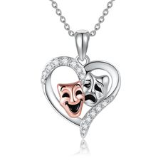 PRICES MAY VARY. 【Unique Design】The comedy and tragedy masks necklace is a symbol of the theater and represent the traditional generic division between comedy and tragedy.They are a beautiful and unique accessory that can be worn to add a bit of flair to any outfit. 【Sterling Silver Material】The comedy and tragedy masks pendant is 925 sterling silver,lead free,nickel free,hypoallergenic,anti-allergy.The pendant chain is dainty but sturdy and the silver is top notch. 【Comedy and Tragedy Masks Cha Comedy And Tragedy Masks, Comedy Tragedy Masks, Tragedy Mask, Face Jewelry, Theatre Gifts, Comedy And Tragedy, Face Jewellery, Mask Necklace, Great Gifts For Women