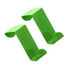 pair of green plastic door stoppers on white background with clipping area for text