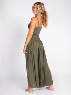 Meet the comfiest pants ever! Our Make A Move Palazzo Pants have a wide leg silhouette, a smocked waistband, and the most flattering fit! The best thing about them is the raw edge hem so you can cut to your own length… they even look great cropped! They’re so cute paired with any of our tanks and tees or can easily be dressed up, making them perfect to wear no matter the occasion! You'll literally want to wear them every day! Casual Wide Leg Pants With Wide Waistband, Casual Wide Leg Full-length Pants With Wide Waistband, Casual Wide Leg Pants With Stretch Waistband, Chic Bottoms With Smocked Bodice, Chic Solid Bottoms With Smocked Bodice, Rayon Wide Leg Pants With Elastic Waistband, Stretch Rayon Wide Leg Pants With Elastic Waistband, Wide Leg Pants With Smocked Back, Casual Stretch Bottoms With Smocked Bodice