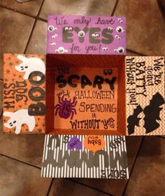 some halloween themed boxes on the floor with words and pictures in them that read, i've only have boos for you