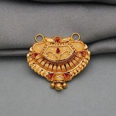 Mangalsutra Pendal Designs Gold, Square Mangalsutra Pendant Gold, 22k Gold Jewelry For Puja, Fusion Style Round Pendant Jewelry For Celebration, Temple Jewelry With Round Gemstone Pendant, Temple Jewelry Gemstone Round Pendant Necklace, Temple Jewelry With Gemstone Round Pendant, Temple Jewelry Necklace With Round Gemstone Pendant, Gold Plated Jewelry With Intricate Design For Puja